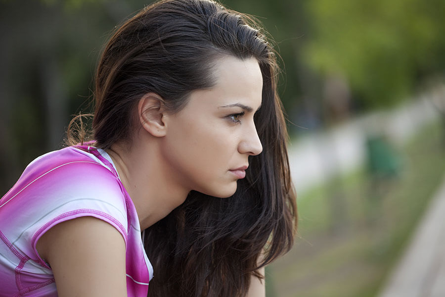 Angry looking young woman ready for substance abuse treatment